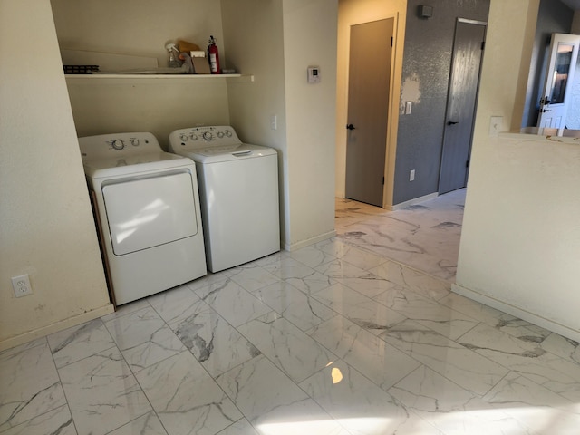 897 Tanglewood Dr, Redding, CA 96003 - washroom with separate washer and dryer and light marble finish flooring