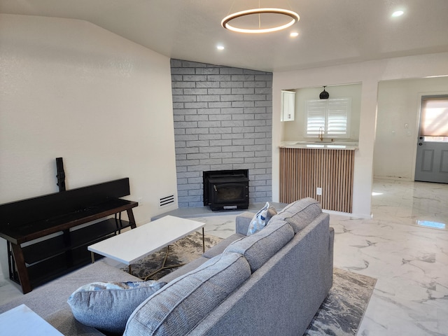 897 Tanglewood Dr, Redding, CA 96003 - living area with marble finish flooring, lofted ceiling, and recessed lighting