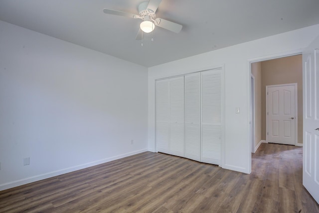 1633 Wee Burn Ct, Redding, CA 96003 - unfurnished bedroom featuring dark wood-type flooring, a closet, and ceiling fan