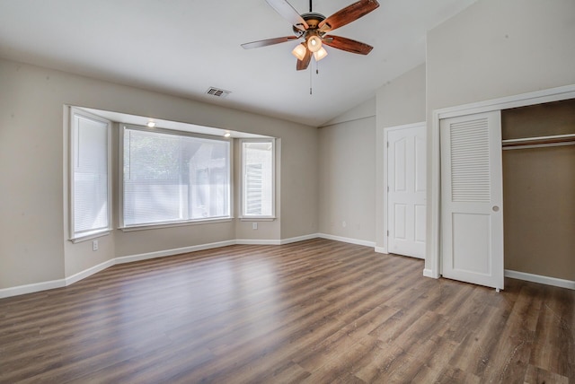 1633 Wee Burn Ct, Redding, CA 96003 - unfurnished bedroom featuring lofted ceiling, dark wood-style flooring, a closet, and ceiling fan