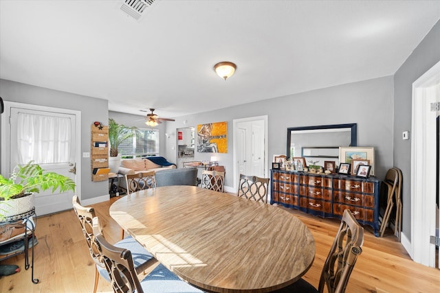 678 W St, Redding, CA 96001 - dining area with light wood-type flooring and ceiling fan