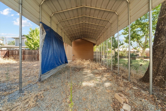 678 W St, Redding, CA 96001 - view of parking with a detached carport