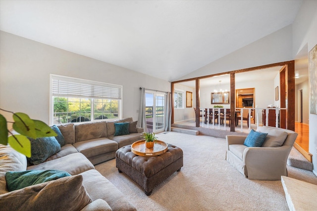 19396 Natalie Way, Redding, CA 96003 - carpeted living room featuring a chandelier and high vaulted ceiling