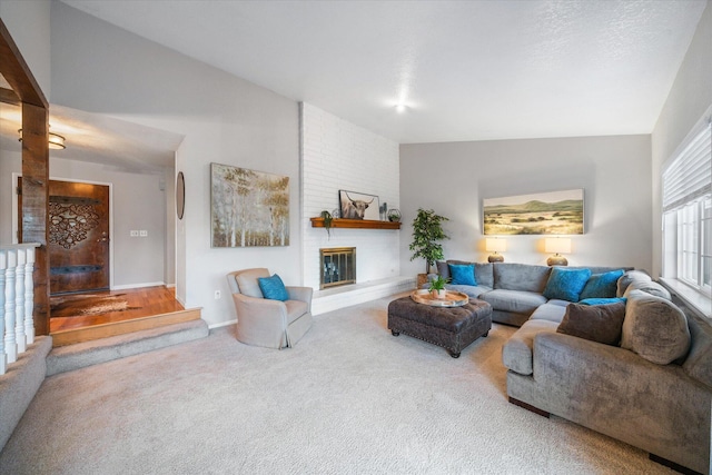 19396 Natalie Way, Redding, CA 96003 - living room featuring carpet floors, a fireplace, and lofted ceiling