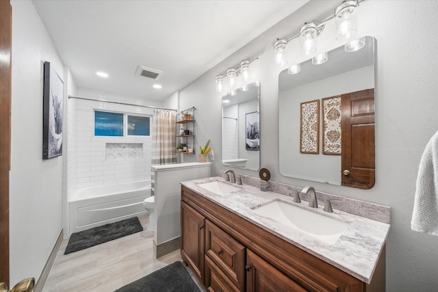 19396 Natalie Way, Redding, CA 96003 - full bathroom with double vanity, wood finished floors, shower / bath combo with shower curtain, and recessed lighting