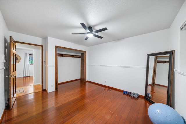 19396 Natalie Way, Redding, CA 96003 - unfurnished bedroom with a closet, hardwood / wood-style flooring, and a ceiling fan