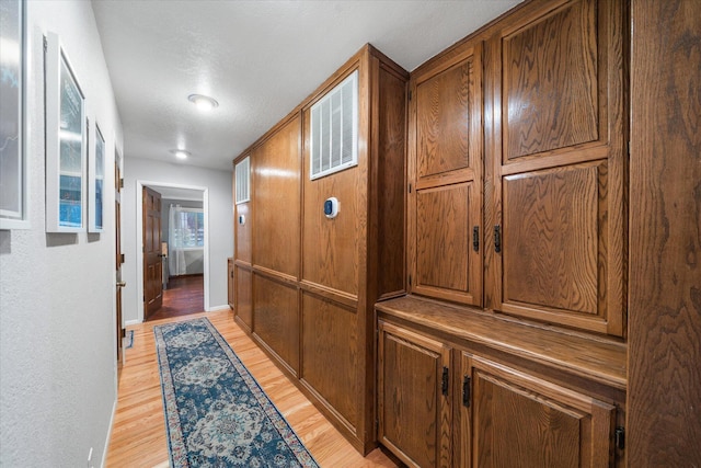 19396 Natalie Way, Redding, CA 96003 - hallway featuring light wood-style floors and baseboards