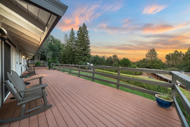 19396 Natalie Way, Redding, CA 96003 - deck at dusk with view of wooded area