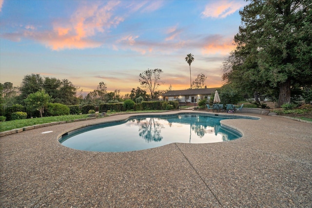 19396 Natalie Way, Redding, CA 96003 - pool at dusk with an outdoor pool and a patio