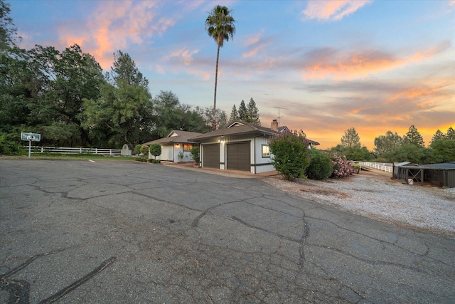 19396 Natalie Way, Redding, CA 96003 - view of front of property with a chimney and view of scattered trees