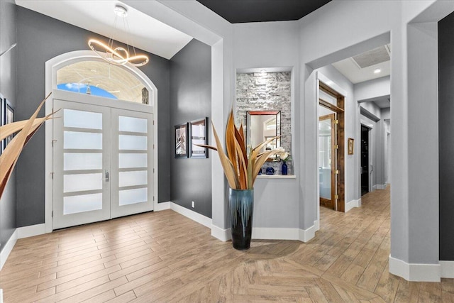 19580 Mockingbird Ln, Redding, CA 96002 - entryway featuring a chandelier and wood finished floors