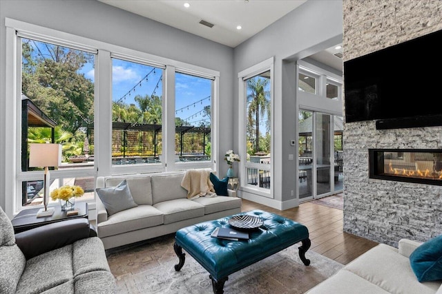 19580 Mockingbird Ln, Redding, CA 96002 - living area featuring plenty of natural light, wood finished floors, recessed lighting, and a fireplace