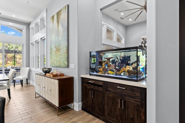 19580 Mockingbird Ln, Redding, CA 96002 - bar area featuring light wood-type flooring and recessed lighting