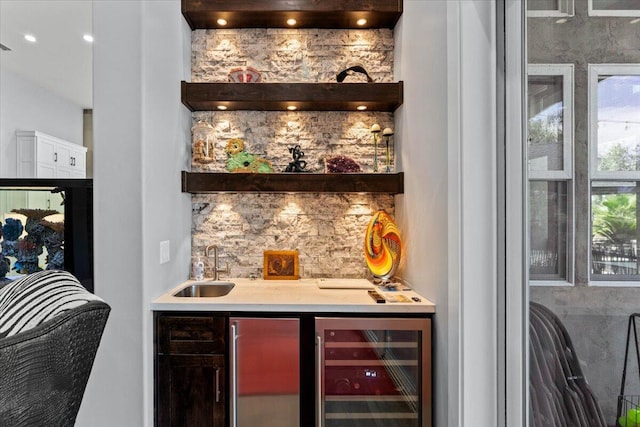 19580 Mockingbird Ln, Redding, CA 96002 - indoor wet bar featuring wine cooler, fridge, and backsplash