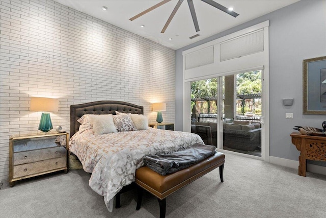 19580 Mockingbird Ln, Redding, CA 96002 - bedroom featuring access to exterior, carpet, brick wall, and ceiling fan