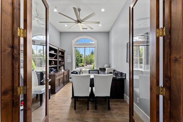 19580 Mockingbird Ln, Redding, CA 96002 - dining area featuring light wood-style floors, ceiling fan, and a desk