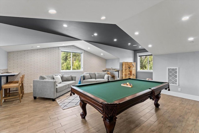 19580 Mockingbird Ln, Redding, CA 96002 - playroom featuring lofted ceiling, light wood finished floors, healthy amount of natural light, pool table, and brick wall