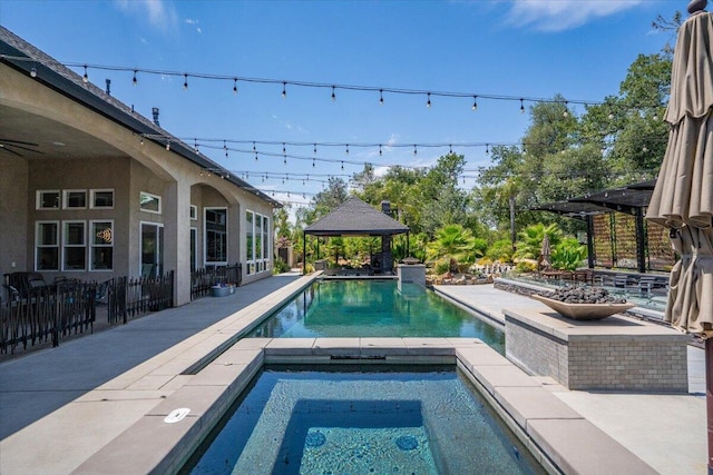 19580 Mockingbird Ln, Redding, CA 96002 - outdoor pool with a gazebo, an in-ground hot tub, and a patio area
