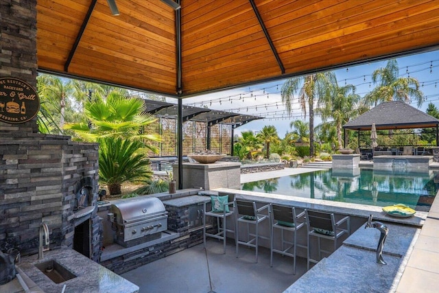 19580 Mockingbird Ln, Redding, CA 96002 - view of patio / terrace with a gazebo, area for grilling, and an outdoor pool