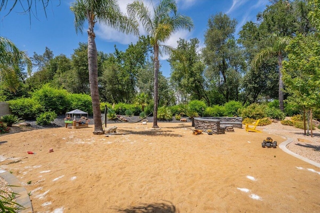 19580 Mockingbird Ln, Redding, CA 96002 - view of yard featuring view of wooded area