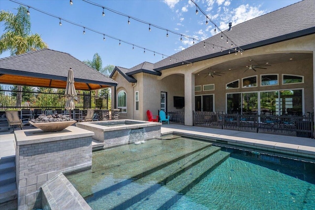 19580 Mockingbird Ln, Redding, CA 96002 - view of swimming pool with a ceiling fan, a patio area, a pool with connected hot tub, and a gazebo