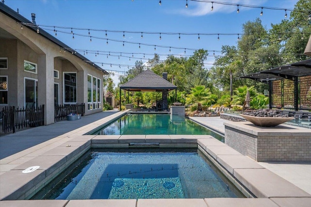 19580 Mockingbird Ln, Redding, CA 96002 - swimming pool with a gazebo, an in-ground hot tub, and a patio