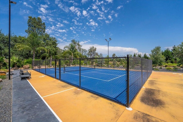 19580 Mockingbird Ln, Redding, CA 96002 - view of tennis court with view of wooded area