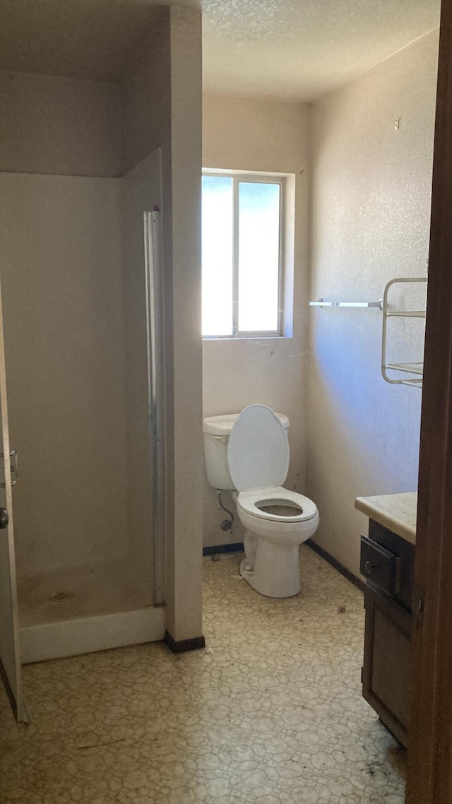 770 Day Rd, Mcarthur, CA 96056 - full bathroom with vanity, a stall shower, and tile patterned floors