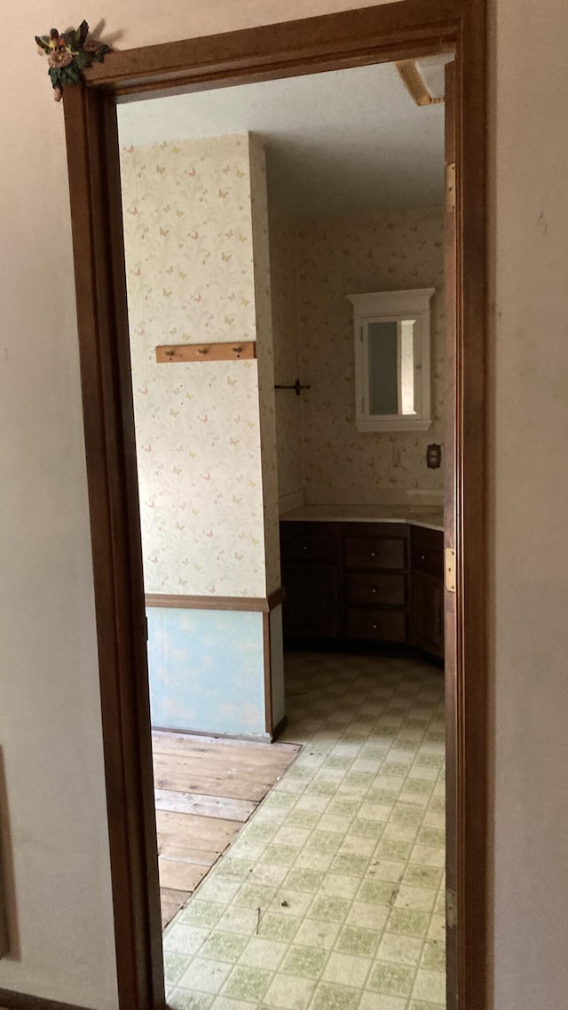 770 Day Rd, Mcarthur, CA 96056 - corridor featuring light flooring and wallpapered walls
