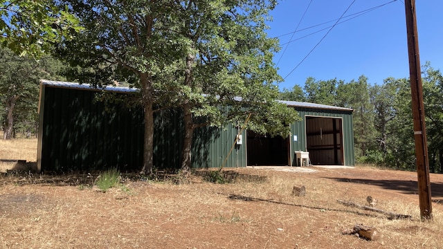 770 Day Rd, Mcarthur, CA 96056 - view of yard with an outdoor structure and a detached garage