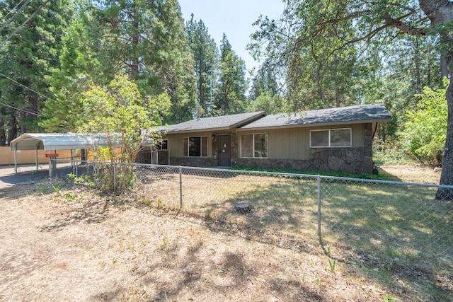 37347 Cypress Ave, Burney, CA 96013 - single story home with stone siding and a carport