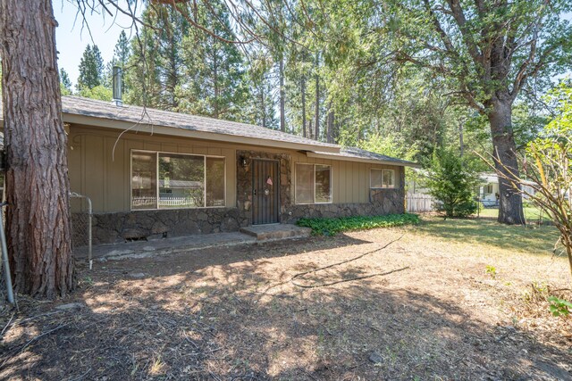 37347 Cypress Ave, Burney, CA 96013 - view of front of house with stone siding and board and batten siding