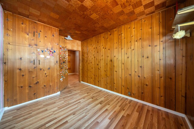 37347 Cypress Ave, Burney, CA 96013 - unfurnished room featuring wood finished floors and wooden walls