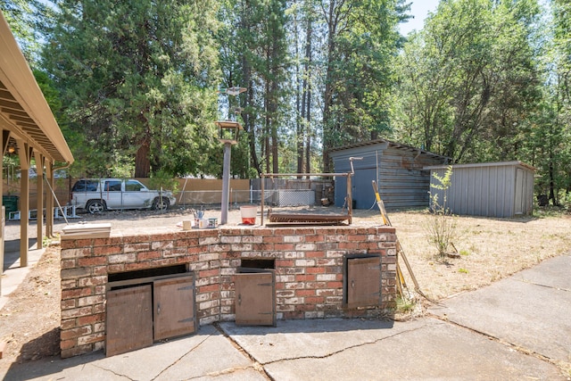 37347 Cypress Ave, Burney, CA 96013 - view of patio / terrace with a shed
