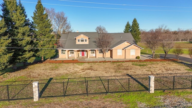 3010 Mateo Ct, Anderson, CA 96007 - cape cod home featuring stucco siding and covered porch