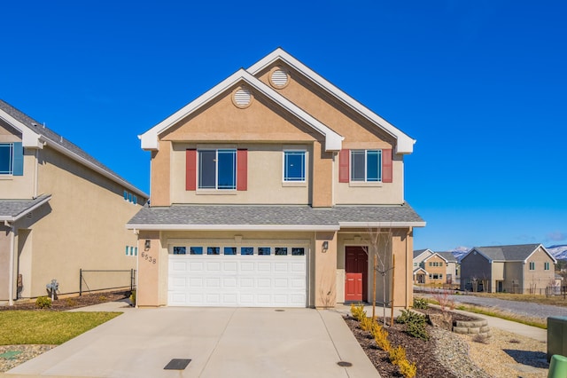 6538 Bandito Dr, Redding, CA 96003 - traditional-style house with stucco siding, a garage, concrete driveway, and a residential view