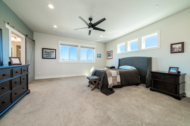 6538 Bandito Dr, Redding, CA 96003 - bedroom featuring a barn door, carpet, recessed lighting, and ceiling fan