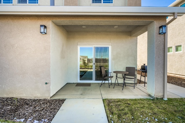 6538 Bandito Dr, Redding, CA 96003 - doorway to property with a patio area and stucco siding