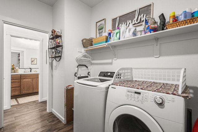 18710 Saddleback Ridge Rd, Cottonwood, CA 96022 - laundry room with separate washer and dryer and dark wood-type flooring