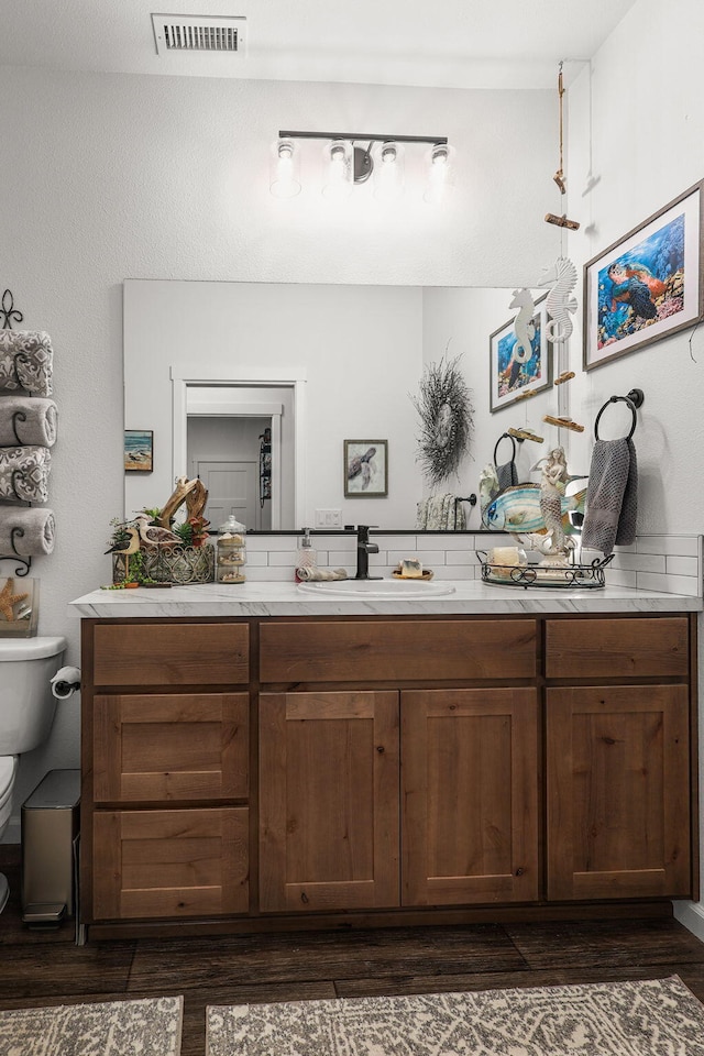 18710 Saddleback Ridge Rd, Cottonwood, CA 96022 - bathroom featuring vanity and wood finished floors