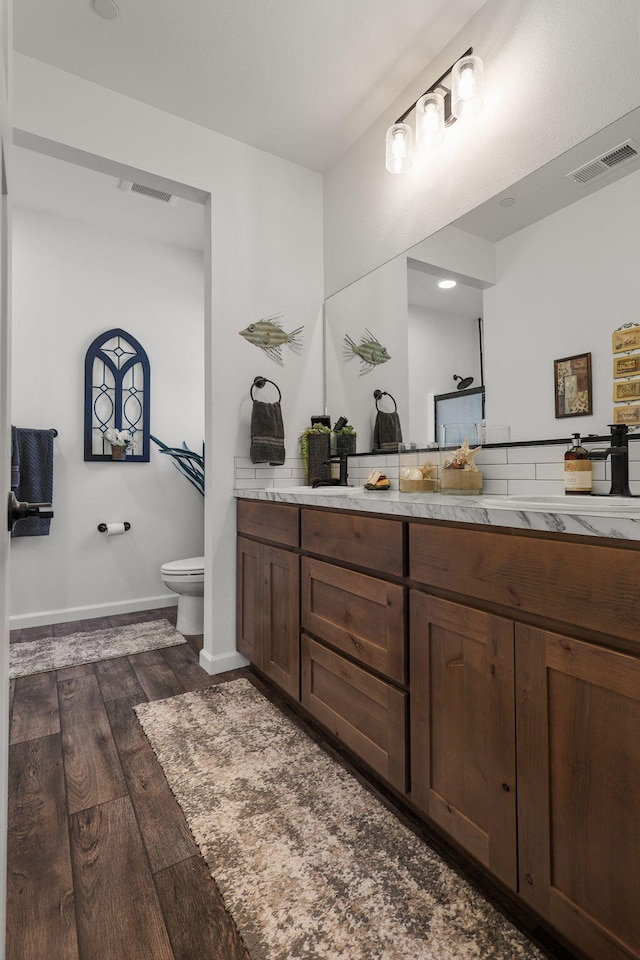 18710 Saddleback Ridge Rd, Cottonwood, CA 96022 - bathroom featuring wood finished floors and vanity