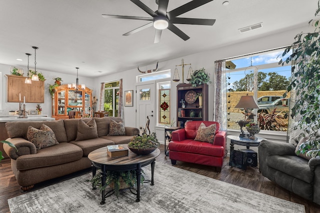 18710 Saddleback Ridge Rd, Cottonwood, CA 96022 - living room featuring wood finished floors, a ceiling fan, and healthy amount of natural light
