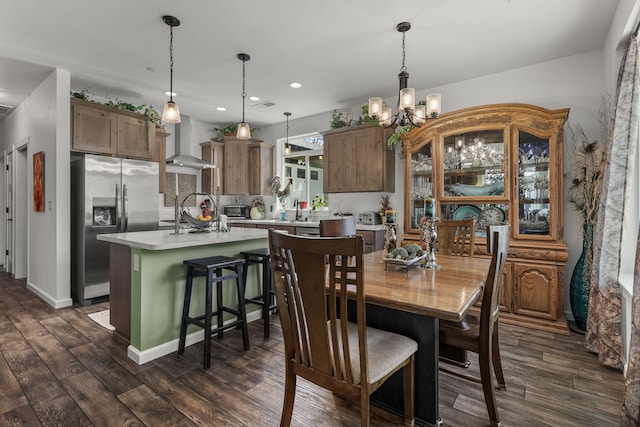 18710 Saddleback Ridge Rd, Cottonwood, CA 96022 - dining space featuring recessed lighting, a chandelier, and dark wood-type flooring