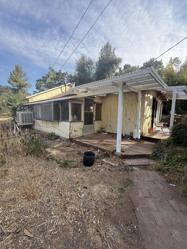 3400 Beacon Dr, Anderson, CA 96007 - rear view of house with a sunroom