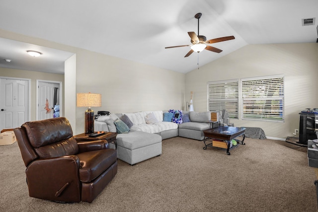 1870 Trumpet Dr, Redding, CA 96003 - carpeted living room with a ceiling fan, lofted ceiling, and a wood stove
