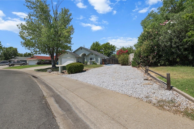 1870 Trumpet Dr, Redding, CA 96003 - single story home featuring an attached garage and concrete driveway