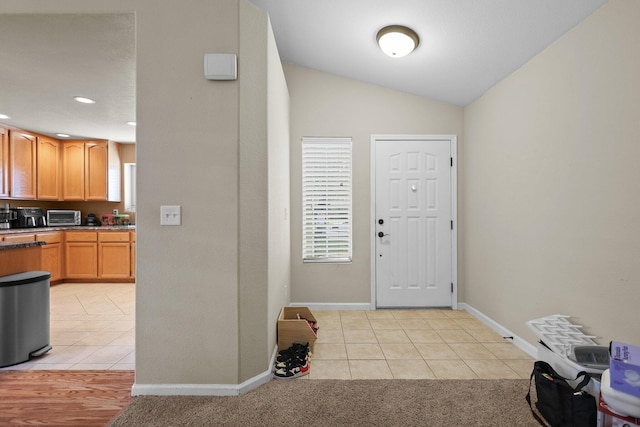 1870 Trumpet Dr, Redding, CA 96003 - foyer featuring light tile patterned flooring, vaulted ceiling, and recessed lighting
