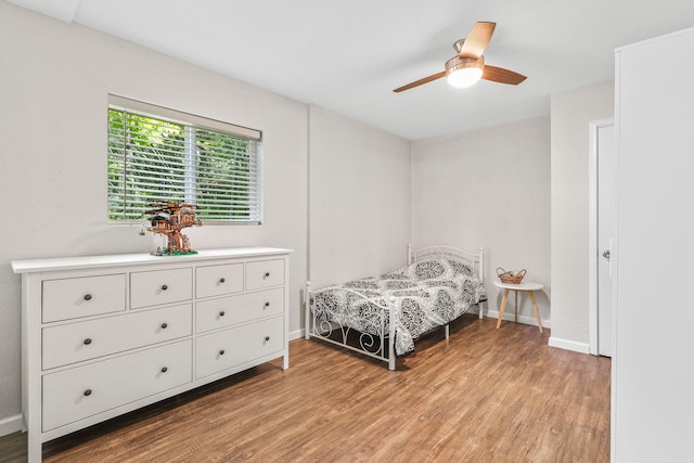 1575 Fig Ave, Redding, CA 96001 - bedroom with light wood finished floors and a ceiling fan