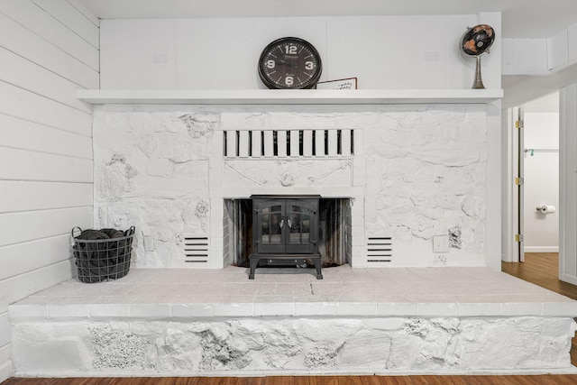 1575 Fig Ave, Redding, CA 96001 - detailed view of wood finished floors and a wood stove