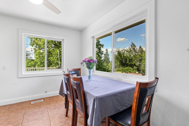 1575 Fig Ave, Redding, CA 96001 - tiled dining room with plenty of natural light and ceiling fan